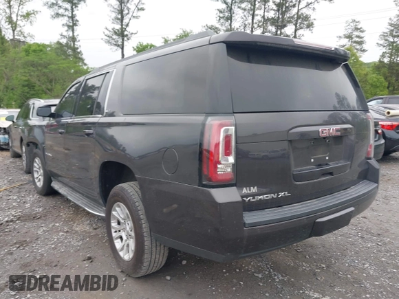 2015 GMC Yukon XL SLE z VIN 1GKS1GKC8FR507436, wystawiony jako IAAI lot #42113696 z przebiegiem Nie podano mil oraz . Historia ofert i sprzedaży dostępna na DreamBid. Obrazek 3.