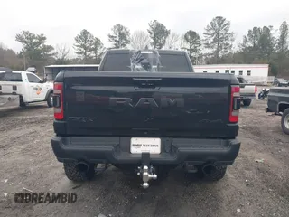 2022 Ram 1500 TRX with VIN 1C6SRFU9XNN476106, listed as a IAAI auction lot 41627895 with 21,992 mi miles and . Bid and sale history available at DreamBid. Image 16.