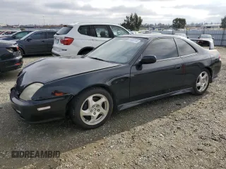 2001 Honda Prelude with VIN JHMBB62461C002744, listed as a Copart auction lot 84906114 with 218,903 mi miles and Salvage Title. Bid and sale history available at DreamBid. Image 1.