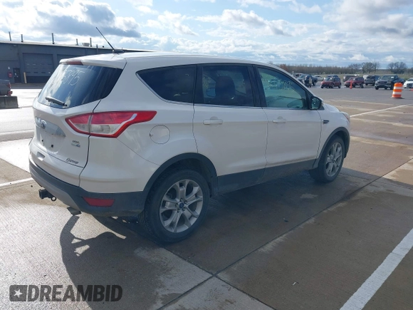 2013 Ford Escape SEL with VIN 1FMCU9H94DUB29989, listed as a IAAI auction lot 42075895 with 147,242 mi miles and . Bid and sale history available at DreamBid. Image 4.