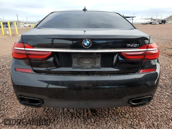 2019 BMW 7 Series 740i с VIN WBA7E2C55KB454929, выставлен на аукционе Copart как лот 49166235 с пробегом 57 051 миль миль и Списание • Salvage title. История ставок и продаж доступна на DreamBid. Изображение 6.