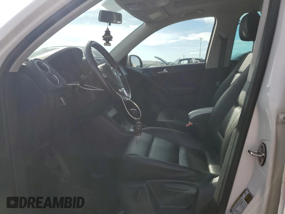 2014 Volkswagen Tiguan Trendline with VIN WVGJV3AX9EW540904, listed as a Copart auction lot 63908715 with Not provided miles and Salvage title. Bid and sale history available at DreamBid. Image 7.
