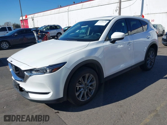 2021 Mazda CX-5 Grand Touring with VIN JM3KFBDM6M0483135, listed as a IAAI auction lot 41590430 with 33,466 mi miles. Bid and sale history available at carsss.com. Image 17.