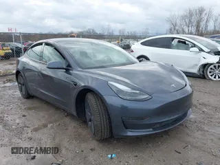 2022 Tesla Model 3 Long Range with VIN 5YJ3E1EB8NF201023, listed as a IAAI auction lot 41942943 with 30,635 mi miles. Bid and sale history available at carsss.com. Image 1.