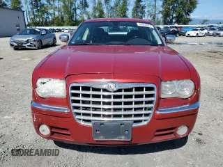 2008 Chrysler 300 C Hemi with VIN 2C3KA63H48H218609, listed as a Copart auction lot 69054664 with 184,118 mi miles and Salvage Title. Bid and sale history available at carsss.com. Image 5.