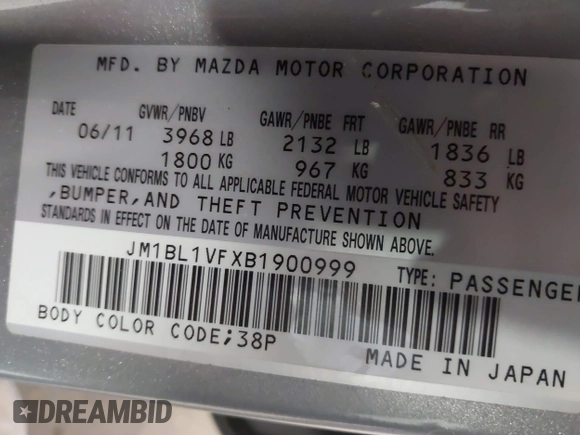 2011 Mazda Mazda3 i Touring with VIN JM1BL1VFXB1900999, listed as a IAAI auction lot 42067239 with 202,829 mi miles. Bid and sale history available at carsss.com. Image 9.