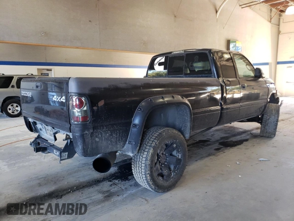 2002 Dodge Ram 2500 with VIN 3B7KF23C82M255391, listed as a Copart auction lot 73115584 with 216,242 mi miles and Salvage Title. Bid and sale history available at carsss.com. Image 3.