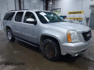 2012 GMC Yukon XL SLT z VIN 1GKS2KE7XCR264075, wystawiony jako IAAI lot #41704966 z przebiegiem 140 598 mil mil oraz . Historia ofert i sprzedaży dostępna na DreamBid. Obrazek 1.