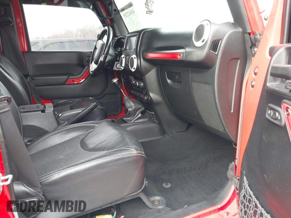 2015 Jeep Wrangler Unlimited Sahara with VIN 1C4BJWEG3FL590491, listed as a IAAI auction lot 41642219 with 148,759 mi miles. Bid and sale history available at carsss.com. Image 5.