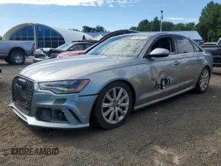 2015 Audi A6 Prestige with VIN WAUHGAFC2FN012777, listed as a Copart auction lot 64166135 with 99,280 mi miles and Salvage title. Bid and sale history available at DreamBid. Image 1.