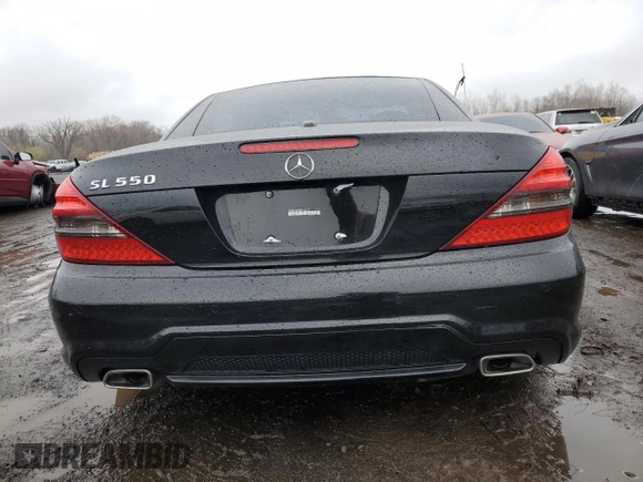 2011 Mercedes-Benz SL 550 with VIN WDBSK7BA8BF165312, listed as a Copart auction lot 51907465 with 32,057 mi miles and Salvage title. Bid and sale history available at DreamBid. Image 6.