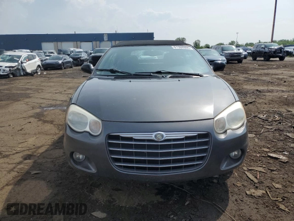 2005 Chrysler Sebring Touring z VIN 1C3EL55R95N535697, wystawiony jako Copart lot #61368865 z przebiegiem 120 596 mil mil oraz Czysty tytuł • Clean title. Historia ofert i sprzedaży dostępna na DreamBid. Obrazek 5.