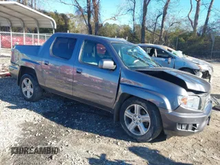 2014 Honda Ridgeline RTL with VIN 5FPYK1F52EB002984, listed as a IAAI auction lot 41347361 with 162,015 mi miles. Bid and sale history available at carsss.com. Image 1.