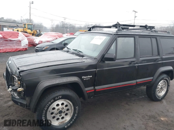 1995 Jeep Cherokee Sport with VIN 1J4FJ68S7SL572730, listed as a IAAI auction lot 41474520 with 189,907 mi miles. Bid and sale history available at carsss.com. Image 17.
