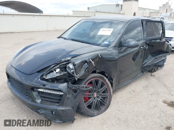 2014 Porsche Cayenne GTS with VIN WP1AD2A25ELA71350, listed as a IAAI auction lot 42031766 with 104,184 mi miles and . Bid and sale history available at DreamBid. Image 17.