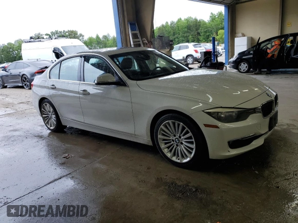 2013 BMW 3 Series 328i with VIN WBA3A5G52DNP18972, listed as a Copart auction lot 58122935 with 209,173 mi miles and Salvage title. Bid and sale history available at DreamBid. Image 4.