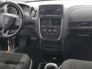 2015 Dodge Grand Caravan American Value with VIN 2C4RDGBG6FR659777, listed as a Copart auction lot 53847385 with 176,802 mi miles and Salvage Title. Bid and sale history available at DreamBid. Image 8.
