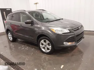 2016 Ford Escape SE z VIN 1FMCU0GX3GUC65692, wystawiony jako IAAI lot #41911016 z przebiegiem 68 113 mil mil oraz . Historia ofert i sprzedaży dostępna na DreamBid. Obrazek 1.