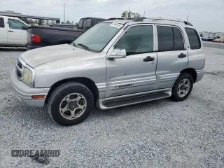 2001 Chevrolet Tracker LT with VIN 2CNBE634416949552, listed as a Copart auction lot 47949135 with 156,515 mi miles and Clean title. Bid and sale history available at DreamBid. Image 1.