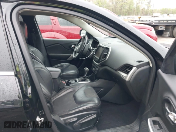 2018 Jeep Cherokee Latitude Plus with VIN 1C4PJLLX7JD504352, listed as a IAAI auction lot 42015977 with 85,157 mi miles and . Bid and sale history available at DreamBid. Image 5.