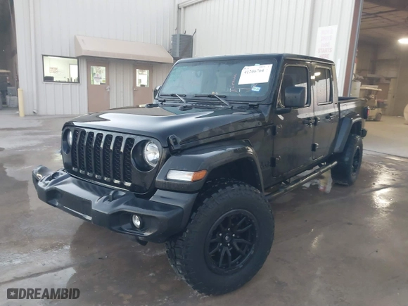 2022 Jeep Gladiator Willys with VIN 1C6HJTAG7NL132408, listed as a IAAI auction lot 41206764 with 57,185 mi miles. Bid and sale history available at carsss.com. Image 18.
