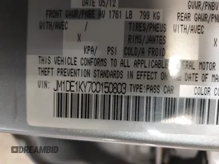 2012 Mazda 2 Sport with VIN JM1DE1KY7C0150803, listed as a IAAI auction lot 41932409 with 89,474 mi miles. Bid and sale history available at carsss.com. Image 9.