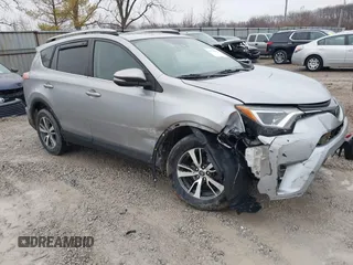 2018 Toyota RAV4 XLE with VIN 2T3RFREV1JW842728, listed as a IAAI auction lot 41519668 with 149,670 mi miles. Bid and sale history available at carsss.com. Image 1.