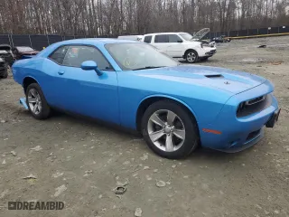 2019 Dodge Challenger SXT with VIN 2C3CDZAG4KH541458, listed as a Copart auction lot 43956305 with 114,179 mi miles and Salvage Title. Bid and sale history available at carsss.com. Image 4.