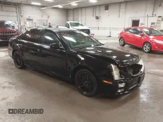 2005 Cadillac STS with VIN 1G6DW677450156901, listed as a IAAI auction lot 41653553 with 125,150 mi miles. Bid and sale history available at carsss.com. Image 1.