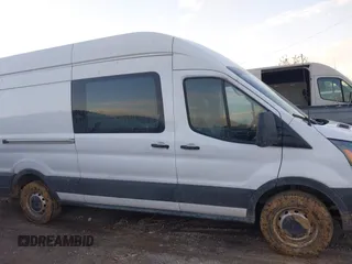 2023 Ford Transit Cargo z VIN 1FTBR3X89PKA82787, wystawiony jako IAAI lot #41330722 z przebiegiem 76 536 mil mil oraz . Historia ofert i sprzedaży dostępna na DreamBid. Obrazek 13.