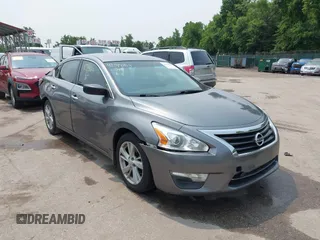 2015 Nissan Altima S z VIN 1N4AL3AP7FC217910, wystawiony jako IAAI lot #42394703 z przebiegiem 100 411 mil mil oraz . Historia ofert i sprzedaży dostępna na DreamBid. Obrazek 1.