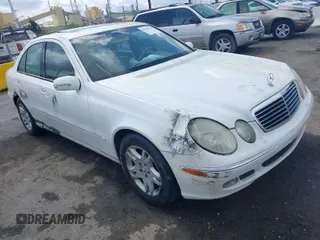 2003 Mercedes-Benz E-Class 3.2L with VIN WDBUF65J23A120318, listed as a IAAI auction lot 41927993 with 113,578 mi miles. Bid and sale history available at carsss.com. Image 1.