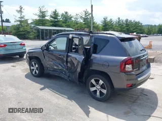 2016 Jeep Compass High Altitude Edition with VIN 1C4NJDEB0GD558230, listed as a IAAI auction lot 39799941 with 57,002 mi miles. Bid and sale history available at carsss.com. Image 3.