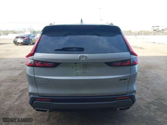 2023 Honda CR-V Hybrid Sport Touring with VIN 7FARS6H95PE004133, listed as a IAAI auction lot 41241806 with 82,427 mi miles. Bid and sale history available at carsss.com. Image 16.