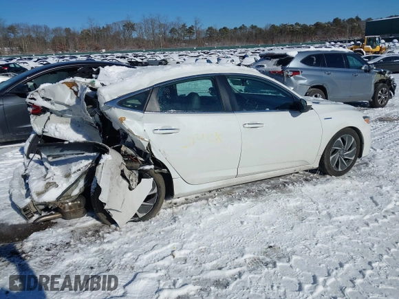 2022 Honda Insight Touring with VIN 19XZE4F99NE017352, listed as a IAAI auction lot 41355664 with 97,865 mi miles and . Bid and sale history available at DreamBid. Image 4.