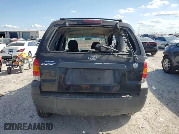 2005 Ford Escape XLS Value with VIN 1FMYU02Z35KB13600, listed as a Copart auction lot 71581184 with 187,747 mi miles and Salvage Title. Bid and sale history available at carsss.com. Image 6.