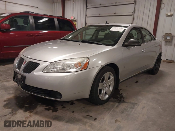 2009 Pontiac G6 w/1SA *Ltd Avail* with VIN 1G2ZG57B094155004, listed as a IAAI auction lot 41925584 with 123,169 mi miles. Bid and sale history available at carsss.com. Image 19.