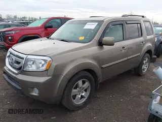 2011 Honda Pilot EX-L with VIN 5FNYF4H51BB076050, listed as a IAAI auction lot 42122883 with 143,288 mi miles and . Bid and sale history available at carsss.com. Image 18.