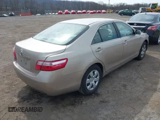 2009 Toyota Camry with VIN 4T1BE46K99U834926, listed as a IAAI auction lot 41853947 with 214,044 mi miles. Bid and sale history available at carsss.com. Image 4.