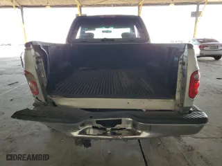 2003 Ford F-150 XL with VIN 1FTRX07233KD43811, listed as a Copart auction lot 85113414 with 215,390 mi miles and Salvage Title. Bid and sale history available at carsss.com. Image 6.