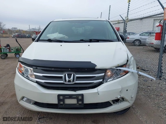2013 Honda Odyssey Touring with VIN 5FNRL5H96DB089336, listed as a IAAI auction lot 41527990 with 128,770 mi miles. Bid and sale history available at carsss.com. Image 12.