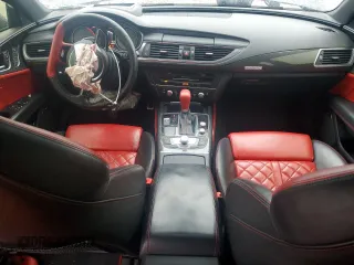 2016 Audi S7 with VIN WAUW2AFC0GN019847, listed as a Copart auction lot 83777124 with 103,009 mi miles and Salvage Title. Bid and sale history available at carsss.com. Image 8.