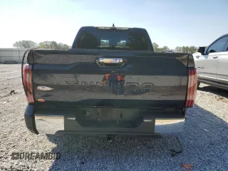 2023 Toyota Tundra 1794 Edition with VIN 5TFMA5AB9PX021944, listed as a Copart auction lot 77756214 with 76,260 mi miles and Salvage title. Bid and sale history available at DreamBid. Image 6.