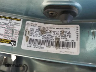 2006 Toyota Corolla CE with VIN 1NXBR32E56Z579489, listed as a Copart auction lot 62107695 with 198,269 mi miles and Salvage title. Bid and sale history available at DreamBid. Image 12.