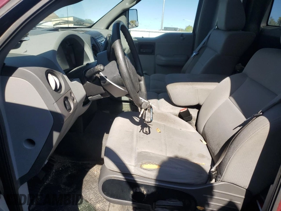 2005 Ford F-150 XL with VIN 1FTRF12W65KC58208, listed as a Copart auction lot 82281114 with 129,774 mi miles and Salvage title. Bid and sale history available at DreamBid. Image 7.