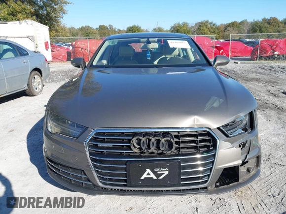 2016 Audi A7 3.0 Premium Plus with VIN WAUWGAFC2GN105498, listed as a IAAI auction lot 41488062 with 120,393 mi miles. Bid and sale history available at carsss.com. Image 12.