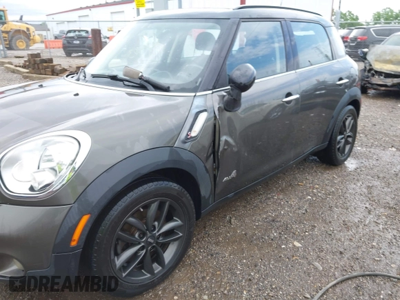2011 MINI Countryman S with VIN WMWZC5C53BWM11022, listed as a IAAI auction lot 42249403 with 173,718 mi miles and . Bid and sale history available at DreamBid. Image 6.
