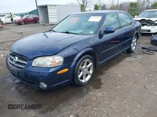2003 Nissan Maxima GLE z VIN JN1DA31A03T412514, wystawiony jako IAAI lot #41856102 z przebiegiem 156 832 mil mil oraz . Historia ofert i sprzedaży dostępna na DreamBid. Obrazek 18.