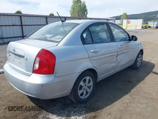 2010 Hyundai Accent GLS with VIN KMHCN4AC1AU476326, listed as a IAAI auction lot 42141297 with 203,607 mi miles. Bid and sale history available at carsss.com. Image 4.