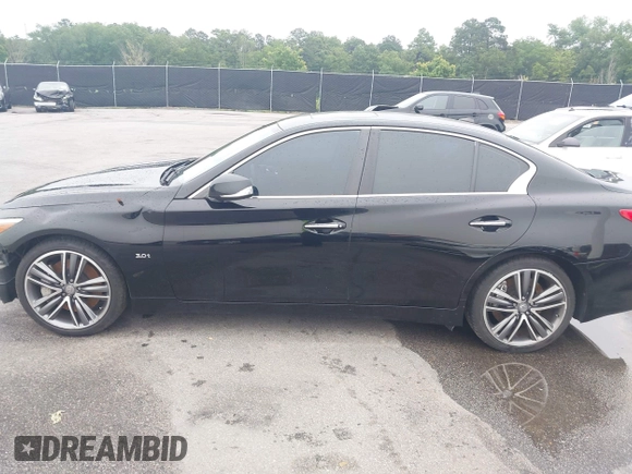 2017 Infiniti Q50 Premium z VIN JN1EV7AP0HM730316, wystawiony jako IAAI lot #42345667 z przebiegiem 123 743 mil mil oraz . Historia ofert i sprzedaży dostępna na DreamBid. Obrazek 14.